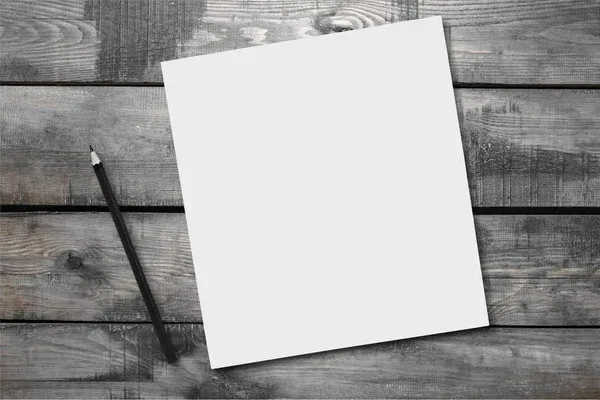 depositphotos_129206010-stock-photo-blank-paper-and-pencil