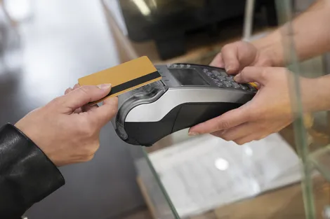 967341-person-paying-using-nfc-technology_0
