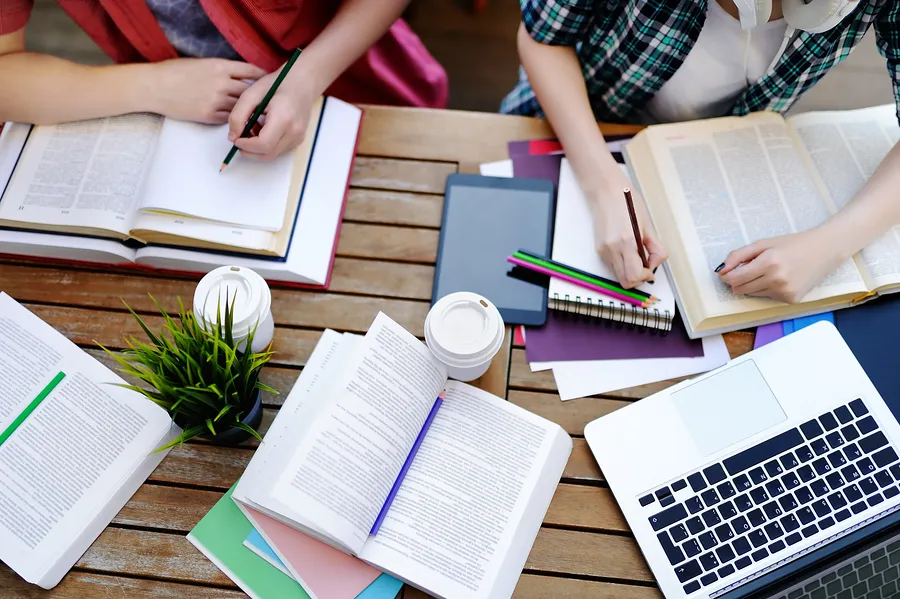 bigstock-Top-View-Of-Young-Students-Wit-204873577