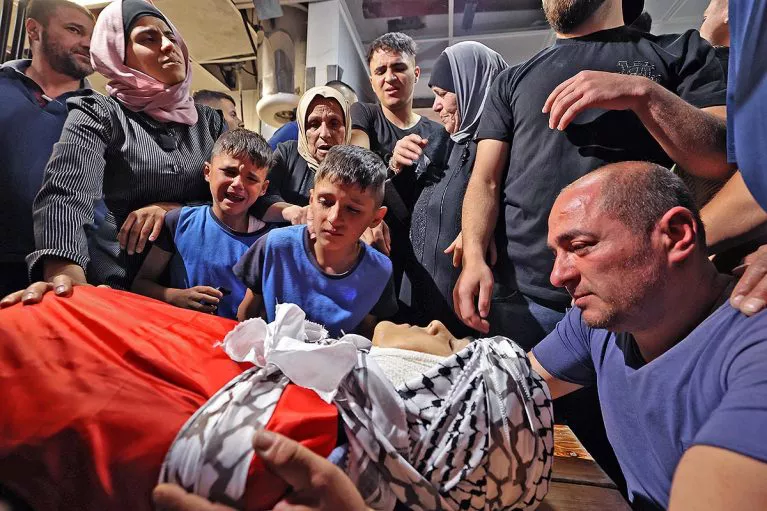 web-adolescente-palestino-asesinado-por-soldados-israelies-afp-767x511